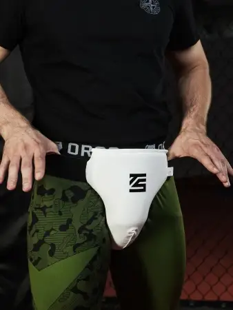 Защита паха мужская, бандаж белый Tomorrow Star с черной резинкой